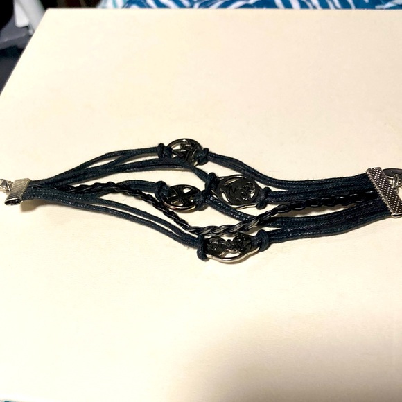 Disney 2015 Faux leather five player bracelet.  Gently owned. Bme2425 - Picture 1 of 2